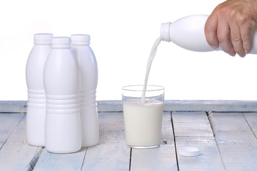 Bottles of milk isolated on white background.
