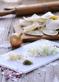 Preparing fresh ravioli at the kitchen table.