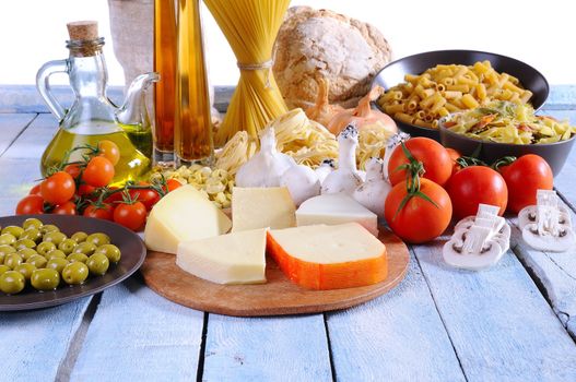 Mediterranean cuisine ingredients on wooden table kitchen.