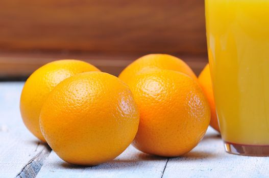 Freshly made orange juice on kitchen table.