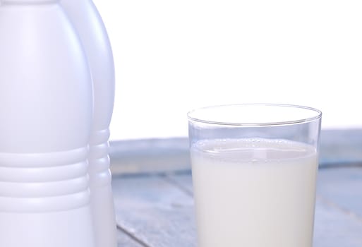 Bottles of milk isolated on white background.