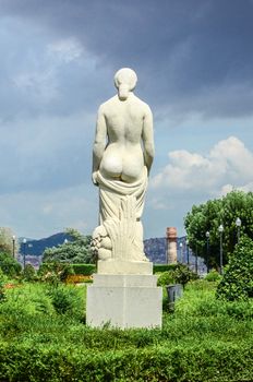 Rear view of a stone statue of a naked woman in Miramar on Mount Montjuïc. Barcelona, ​​Spain