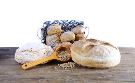 Assorted homemade bread on wooden table bakery