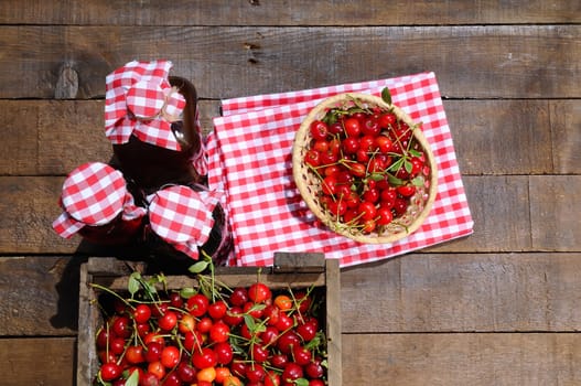 Basket with cherries to make cherry liqueur.