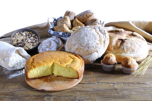 Assorted homemade bread on wooden table bakery