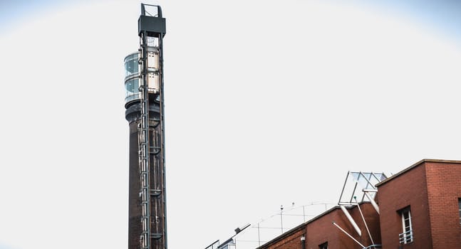 Dublin, Ireland - February 11, 2019: architectural detail of the old distillery of irish whiskey Jameson neighborhood Smithfield Square on a winter day