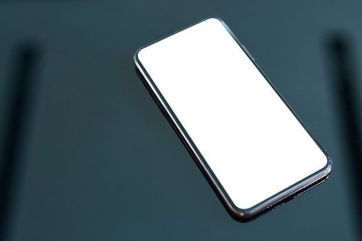 Smart phone show blank screen on black background.