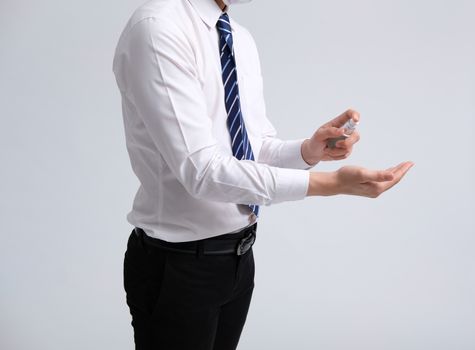 businessman man washing hand with sanitizer dispenser for sanitizing preventing virus bacteria disease infection. health hygiene