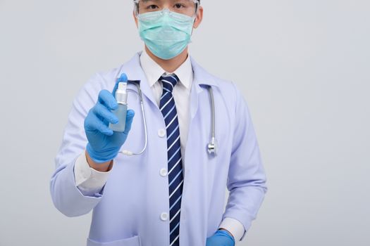 doctor physician practitioner with hand washing alcohol sanitizer dispenser for protecting virus bacteria infection. medical healthcare concept