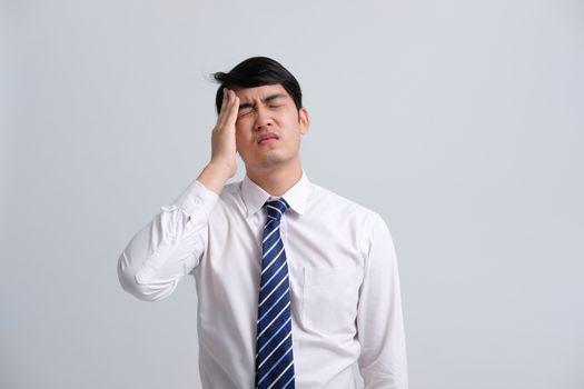 ill businessman man feeling sick, headache from cold flu virus bacteria infection pollution