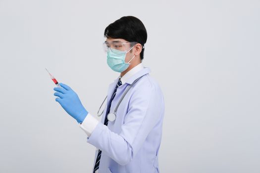 doctor physician practitioner with medicine syringe. medical injection & needle vaccination equipment