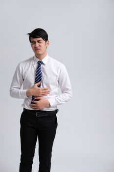 businessman man feeling sick, having painful stomachache. abdominal pain