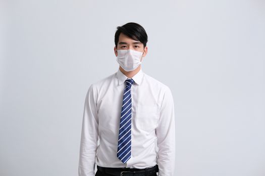 businessman man wearing protective mask against cold flu covid 19 virus bacteria infection pollution