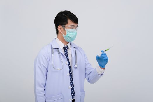 doctor physician practitioner with medicine syringe. medical injection & needle vaccination equipment