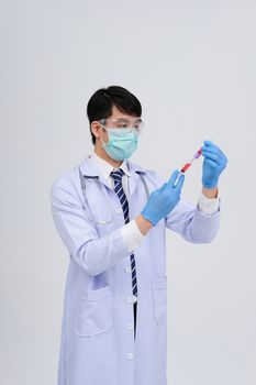 doctor physician practitioner with medicine syringe vial ampule. medical injection & needle vaccination equipment
