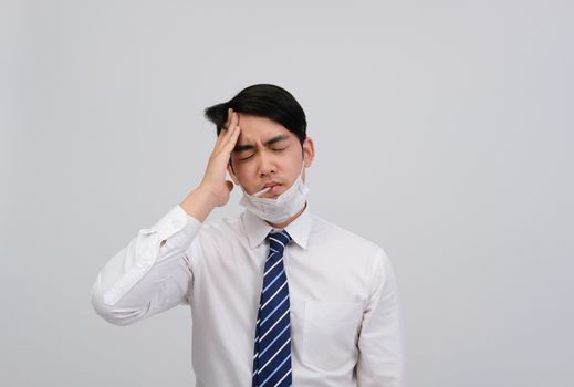 businessman man with thermometer feeling sick, headache from flu covid 19 virus bacteria infection pollution