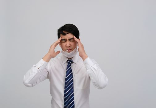 businessman man with thermometer feeling sick, headache from flu covid 19 virus bacteria infection pollution