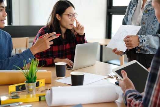 architect engineer interior designer team working discussing on house blueprint of real estate project in meeting. building construction teamwork concept