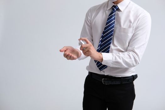 businessman man washing hand with sanitizer dispenser for sanitizing preventing virus bacteria disease infection. health hygiene