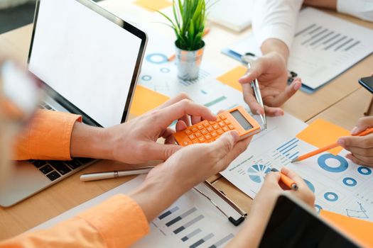 business people discussing on performance revenue in meeting. businessman working with co-worker team. financial adviser analyzing data with investor.