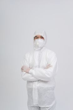 man doctor wearing biological protective uniform suit clothing, mask, gloves for preventing virus bacteria infection contamination