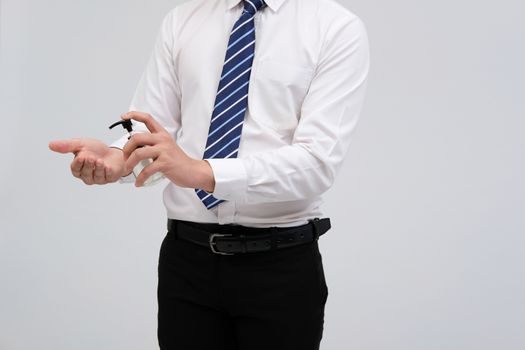 businessman man washing hand with alcohol sanitizer dispenser for sanitizing preventing virus bacteria disease infection. health hygiene