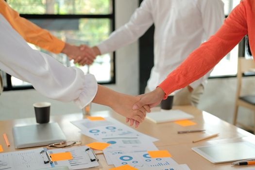 businessman shaking hands after meeting. Business people handshaking. Greeting deal, teamwork partnership concept.