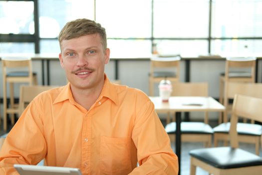 young confident asian executive businessman man smiling at business workplace