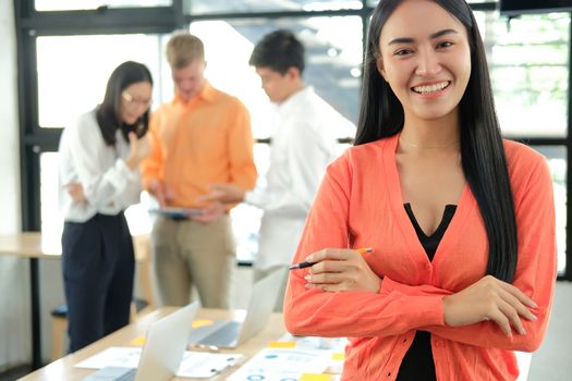 business people discussing on performance revenue in meeting. businesswoman working with co-worker team. financial adviser analyzing data with investor.