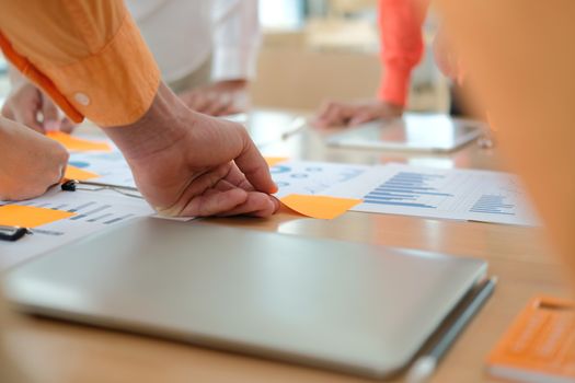 business people discussing on performance revenue in meeting. businesswoman working with co-worker team. financial adviser analyzing data with investor.