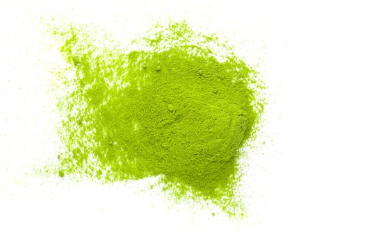 Powdered matcha green tea on white background top view.