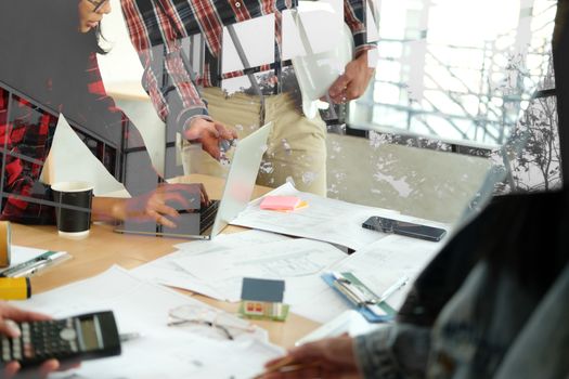 architect engineer interior designer team working discussing on house blueprint of real estate project in meeting. building construction teamwork concept