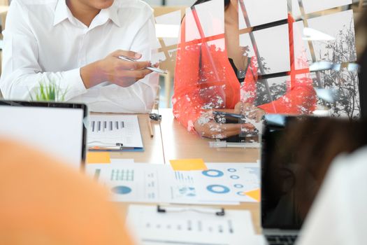 business people discussing on performance revenue in meeting. businessman working with co-worker team. financial adviser analyzing data with investor.