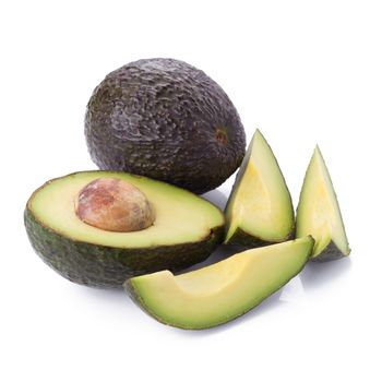 Green ripe avocado isolated on the white background.