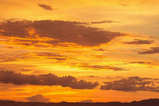 Colorful dramatic sky with cloud at sunset.Sky with sun background.