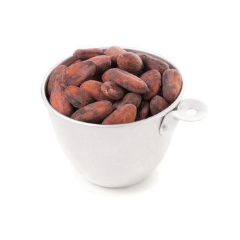 Cocoa fruit, raw cacao beans in cup isolated on a white background.