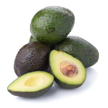 Green ripe avocado isolated on the white background.