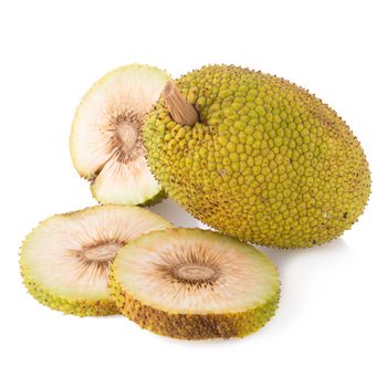 Whole and half fresh breadfruit on white background.