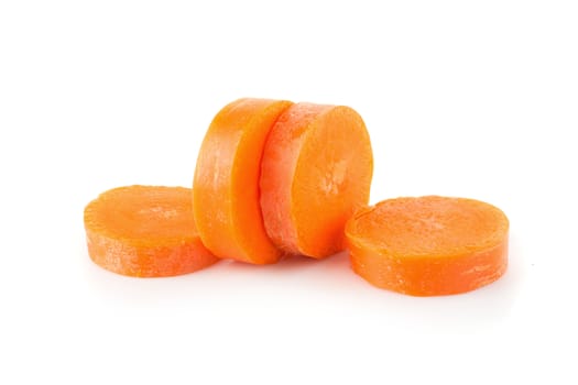 Chopped carrot slices isolated on a white background.