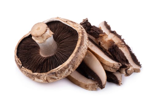 Portobello mushrooms and slice isolated on a white background.