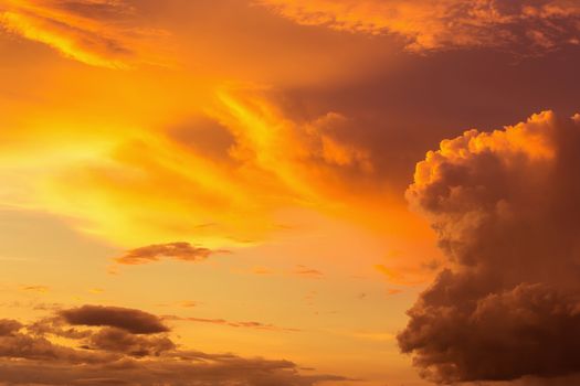 Colorful dramatic sky with cloud at sunset.Sky with sun background.