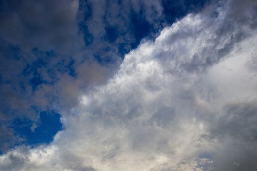 Colorful dramatic sky with cloud at sunset.