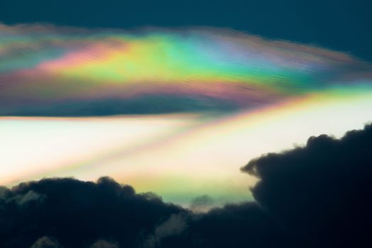 Cloud iridescence, diffraction phenomenon produce very vivid color and make cloud shine like a corona.