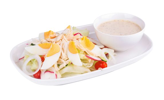 Fresh green salad with chicken and hard-boiled egg Healthy eating.