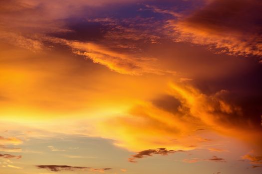 Colorful dramatic sky with cloud at sunset.Sky with sun background.