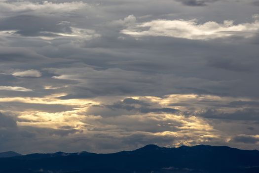 Colorful dramatic sky with cloud at sunset