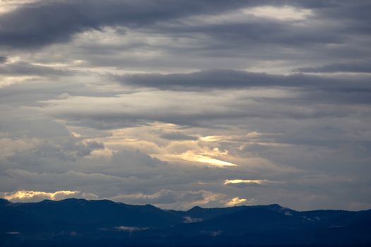 Colorful dramatic sky with cloud at sunset