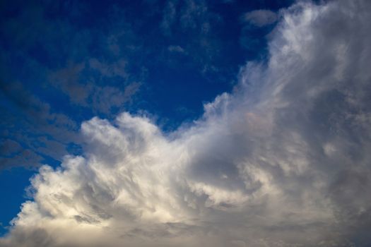 Colorful dramatic sky with cloud at sunset.