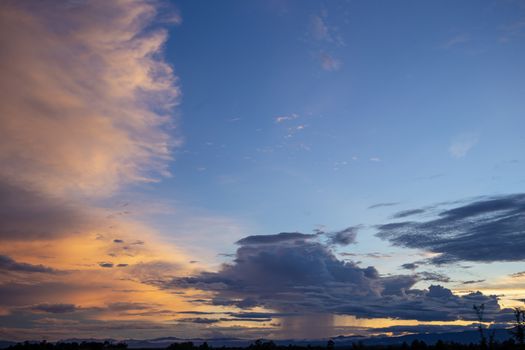 Colorful dramatic sky with cloud at sunset.