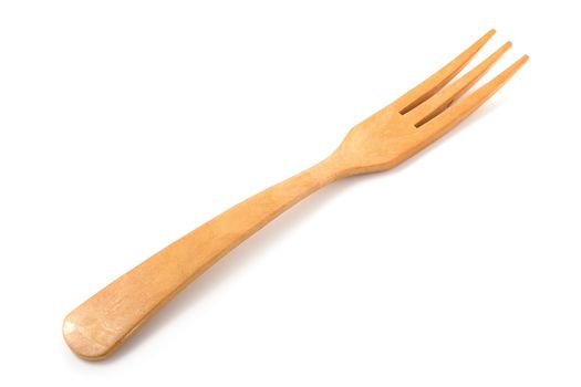 Wooden fork isolated on a white background.